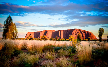 The sandstone formation known as Uluru at sunset in Northern Territory, Australia